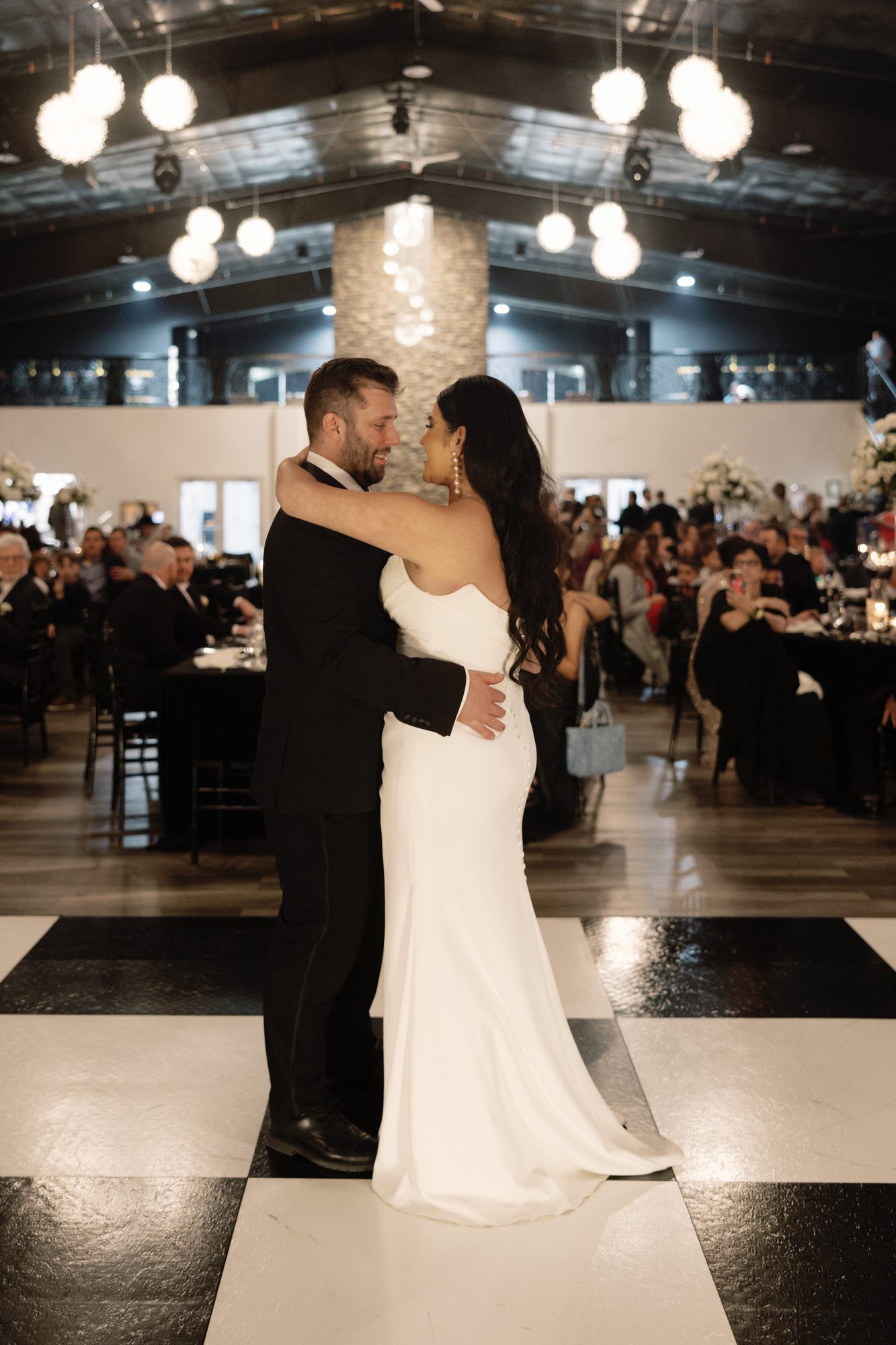 First dance beneath the chandeliers