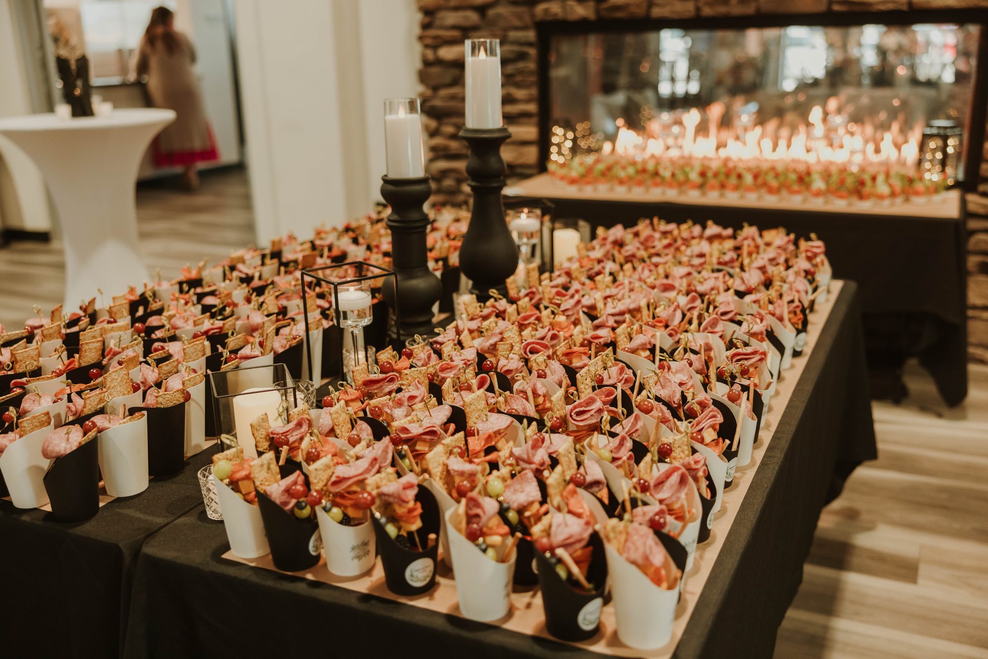Drink station with glass carafes and fresh florals