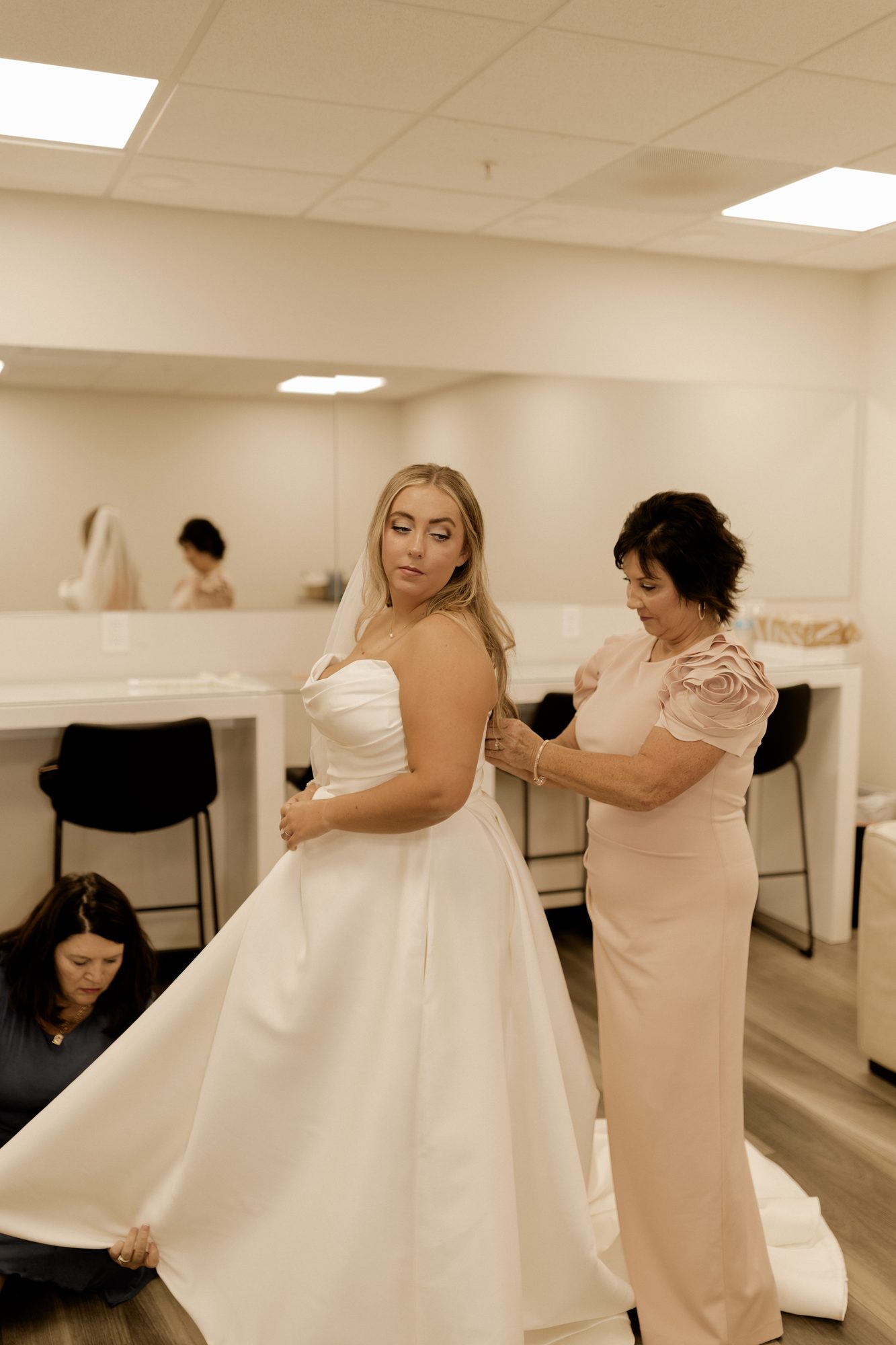 Bride getting ready in the bridal suite